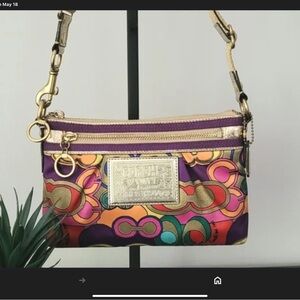 Poppy Coach Crossbody Bag with an Adjustable Strap.ECU